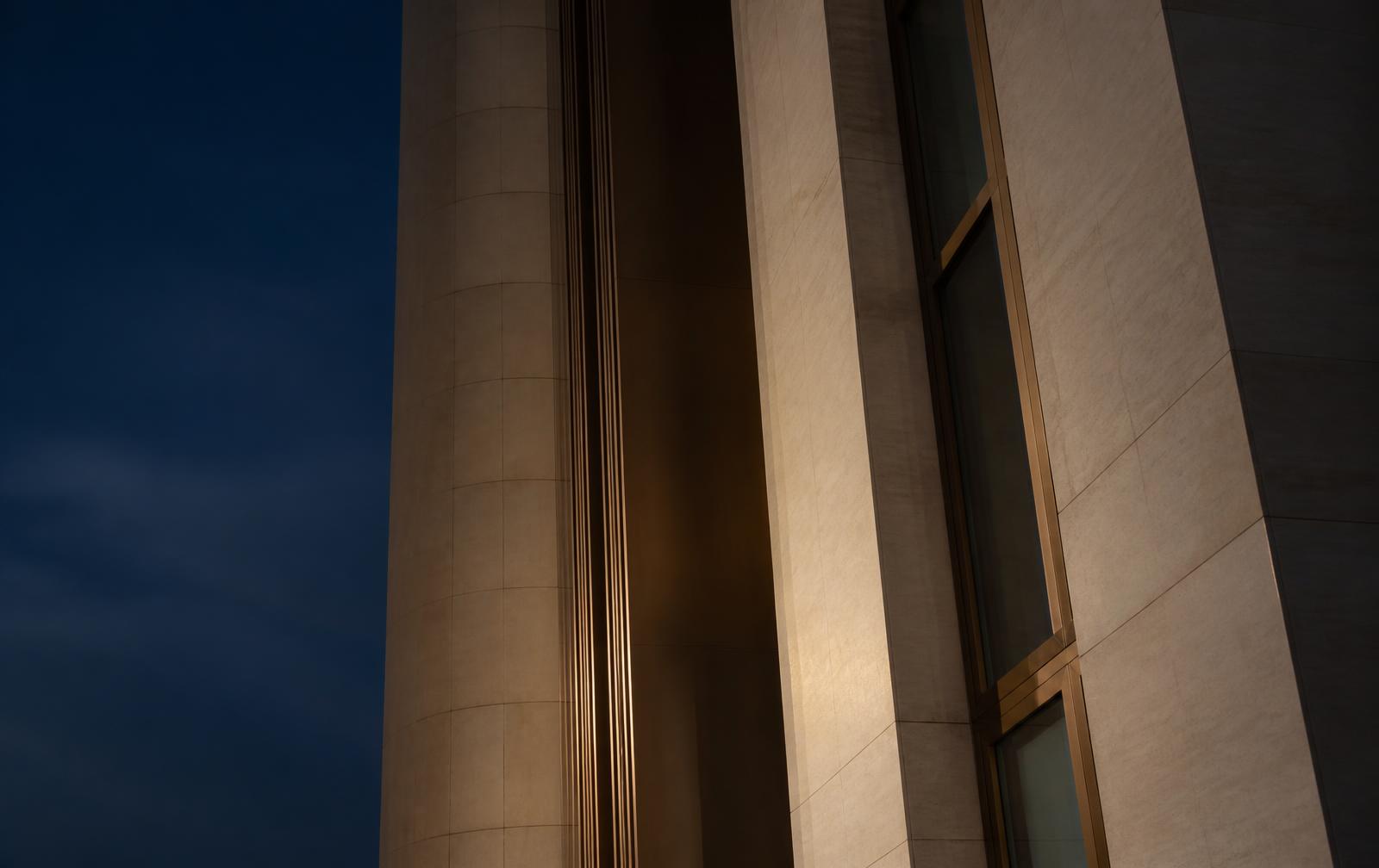 Limestone and bronze tower facade